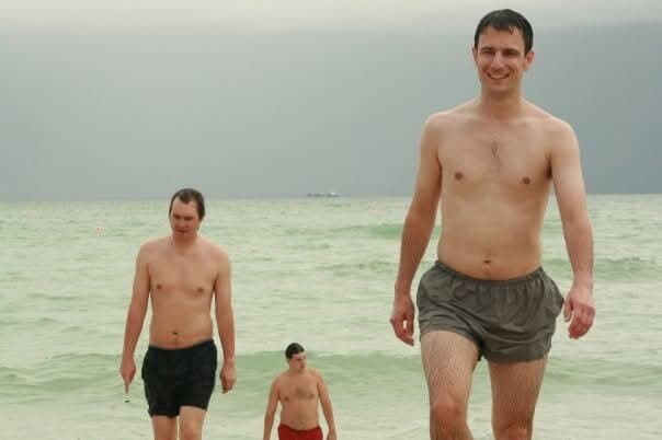 Two of us walking out of the sea on the beach in Miami at GAMMA 2007