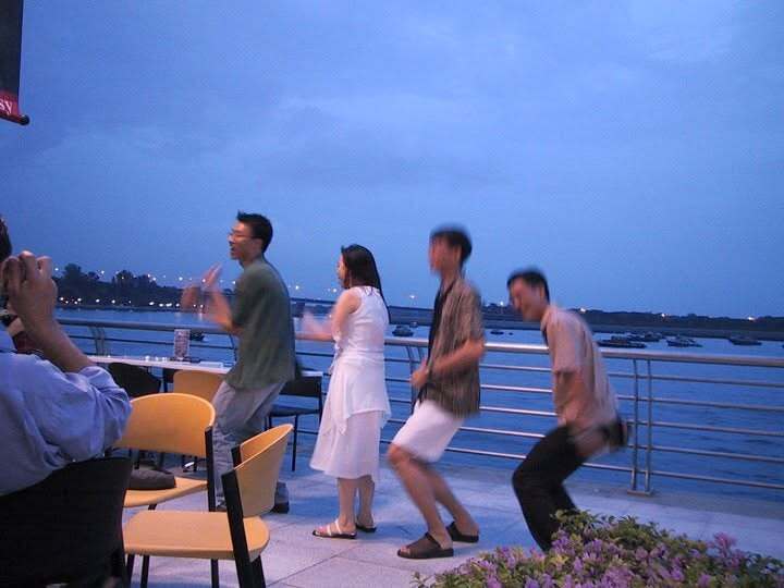 Dancing by the water at dusk