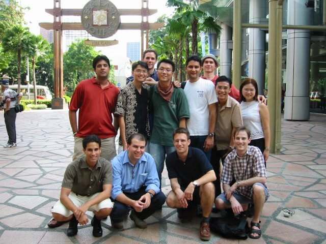 A group of us in front of a big ornamental gate
